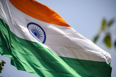 India flag flying high at Connaught Place with pride in blue sky, India flag fluttering, Indian Flag on Independence Day and Republic Day of India, tilt up shot, Waving Indian flag, Har Ghar Tiranga clipart