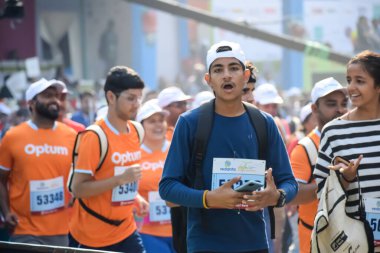 New Delhi, India - October 15 2023 - Vedanta Delhi Half Marathon race after covid in which marathon participants about to cross the finish line, Delhi Half Marathon 2023 clipart