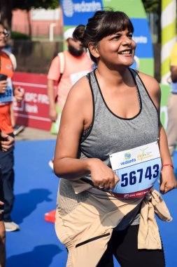 New Delhi, India - October 15 2023 - Vedanta Delhi Half Marathon race after covid in which marathon participants about to cross the finish line, Delhi Half Marathon 2023 clipart