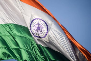 India flag flying high at Connaught Place with pride in blue sky, India flag fluttering, Indian Flag on Independence Day and Republic Day of India, tilt up shot, Waving Indian flag, Har Ghar Tiranga clipart