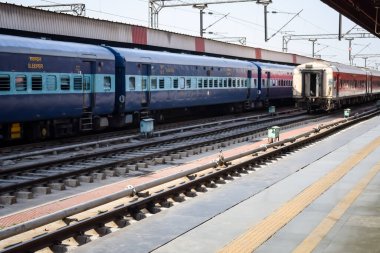 Delhi, India, November 02 2024 - Indian railway express train at departure from Anand Vihar railway station during morning time, Colourful Express train at Delhi railway station clipart