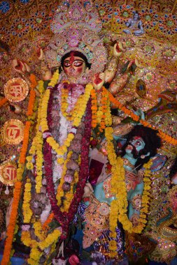 Delhi, India, October 09,2024 - Goddess Durga with traditional look in close up view in Jhilmil Colony Delhi, Durga Puja Idol, A biggest Hindu festival in India clipart