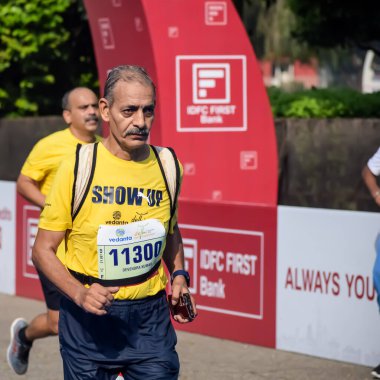 New Delhi, India - October 20 2024 - Vedanta Delhi Half Marathon race after covid in which marathon participants about to cross the finish line, Delhi Half Marathon 2024 clipart