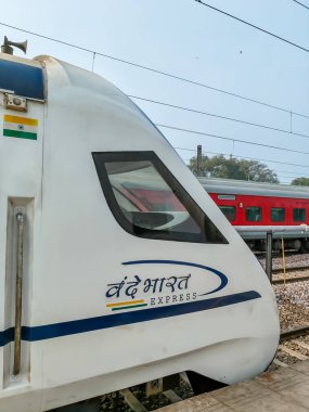 Delhi, India, Dec 31 2024 - Vande Bharat Express train going from Delhi towards Dehradun from Anand Vihar railway station, Vande Bharat fastest Train of India clipart