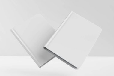 Stack of White Blank Books Displayed on Minimalist Background For Mockup clipart