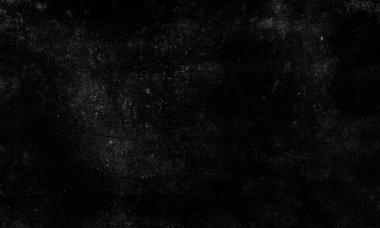 Büyük oranda beyaz toz, çizik ve tahılla kaplanmış siyah bir yüzeye sahip dramatik, karanlık ve soyut bir arkaplan dokusu.