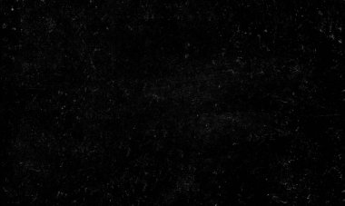 Büyük oranda beyaz toz, çizik ve tahılla kaplanmış siyah bir yüzeye sahip dramatik, karanlık ve soyut bir arkaplan dokusu.