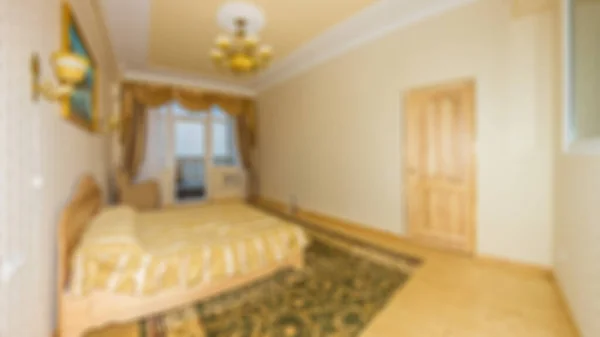 Master bedroom with wood bed and water view for background Abstract blur and defocused apartment, condominium, hotel, commercial building.
