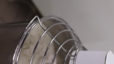 Senior professional chef kneading floured dough at bakery, mature retiree enjoying hobby making homemade bread using traditional recipe isolated on black background close up. High quality footage