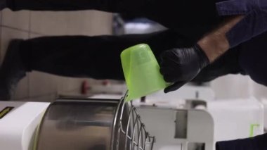 Senior professional chef kneading floured dough at bakery, mature retiree enjoying hobby making homemade bread using traditional recipe isolated on black background close up. High quality footage