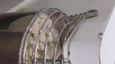 Senior professional chef kneading floured dough at bakery, mature retiree enjoying hobby making homemade bread using traditional recipe isolated on black background close up. High quality footage