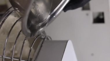 Senior professional chef kneading floured dough at bakery, mature retiree enjoying hobby making homemade bread using traditional recipe isolated on black background close up. High quality footage