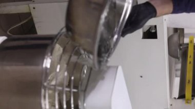 Senior professional chef kneading floured dough at bakery, mature retiree enjoying hobby making homemade bread using traditional recipe isolated on black background close up. High quality footage