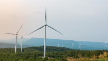 Time lapse of wind turbine for generating electricity from wind power with beautiful sky and clouds