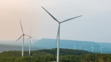 Time lapse of wind turbine for generating electricity from wind power with beautiful sky and clouds