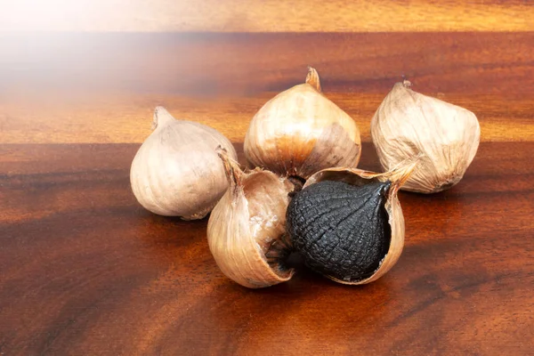 Black Garlic in Nature Background.