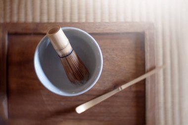 Japanese Bamboo Brush Tea Whisk in nature Background, tradition Japanese tea whisk matcha green tea.