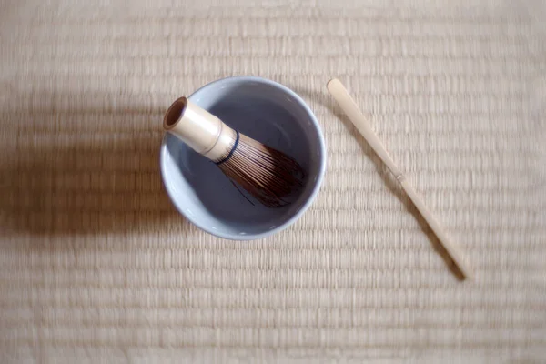 Japanese Bamboo Brush Tea Whisk in nature Background, tradition Japanese tea whisk matcha green tea.