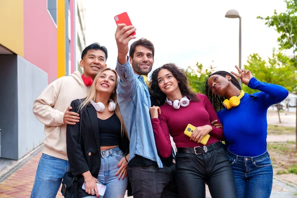 Five Young Multiracial Friends Vibrant Casual Attire Happily Taking Selfie — Stock Photo, Image