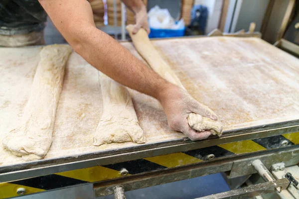 Unrecognizable Baker Expertly Places Raw Baguette Bars Tray Preparing Slide — Stock Photo, Image