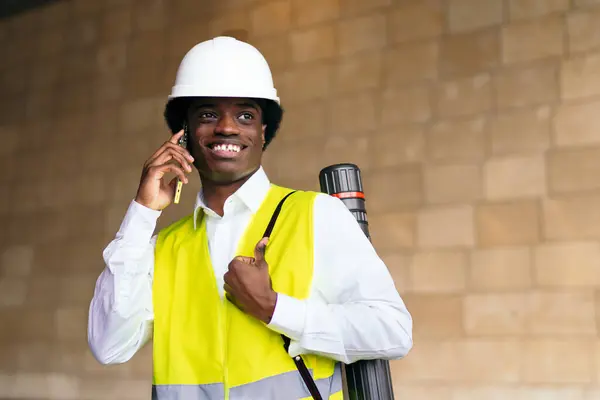 African young African Engineer on Call at a Construction Site