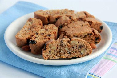 Biscotti - italian double baked cookies with nuts and raisins on the plate