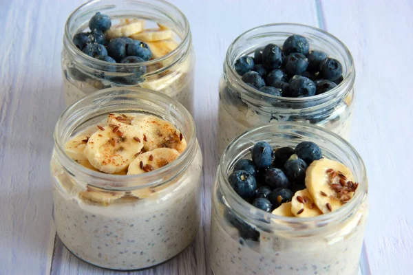 Overnight Oats Banana Blueberries Glass Jars Table Healthy Vegetarian Breakfast — Stock Photo, Image