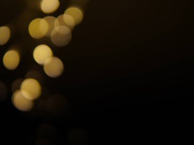 Altın ve koyu kahverengi Bokeh ışıkları şenlikli arka plan. Yüksek kalite fotoğraf