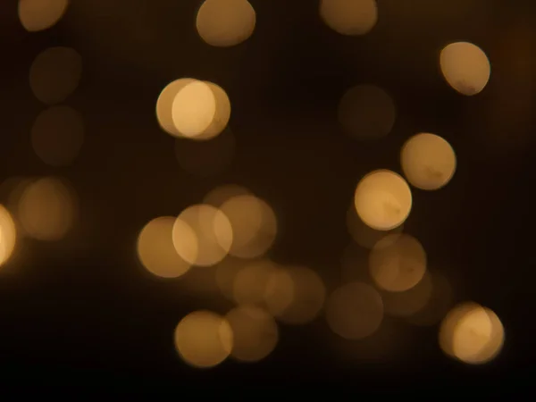 Goldene Und Dunkelbraune Runde Bokeh Lichter Festlichen Hintergrund Hochwertiges Foto — Stockfoto