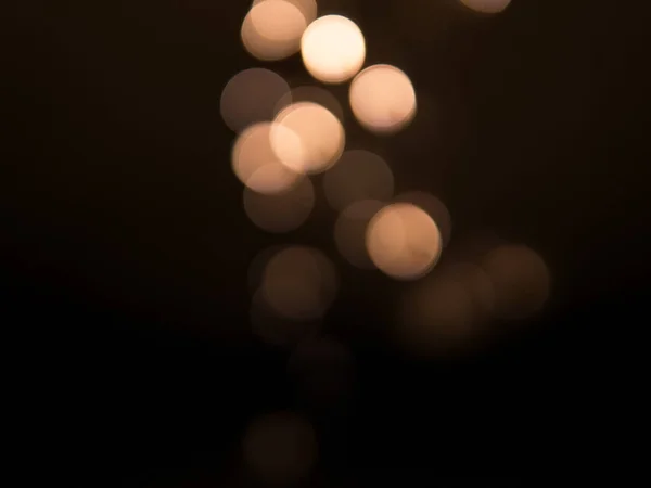 Gouden Donkerbruine Ronde Bokeh Lichten Feestelijke Achtergrond Hoge Kwaliteit Foto — Stockfoto
