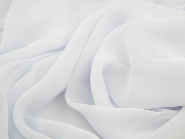 white creased fatin fabric background copy space.