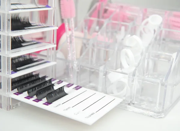 beauty salon equipment for eyelash extensions ,tools or lash technician white and pink colors.
