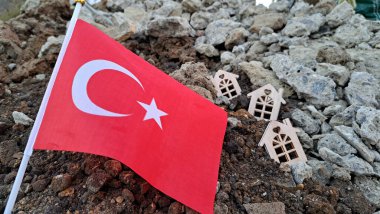 National flag of Turkey on the cracked ground,earthquake concept 2023 tragedy . High quality photo clipart