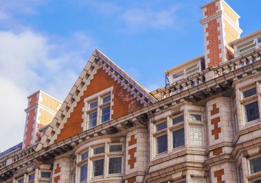 High-rise buildings on blue sky background,streets of big city.