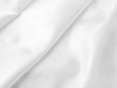 white silk fabrik background with copy space for inscription,satin backdrop and wallpaper.