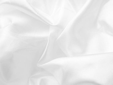 white silk fabrik background with copy space for inscription,satin backdrop and wallpaper.