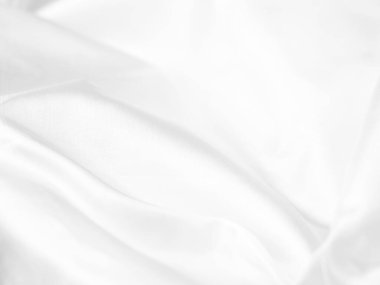 white silk fabrik background with copy space for inscription,satin backdrop and wallpaper.