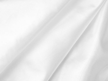 white silk fabrik background with copy space for inscription,satin backdrop and wallpaper.