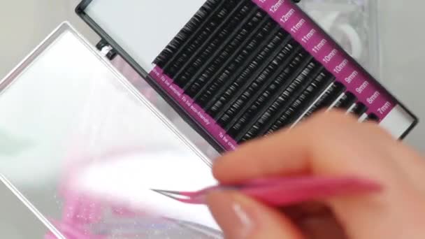 Equipment Eyelash Extensions Beauty Salon Pink Tweezers Fake Lashes — Stock Video