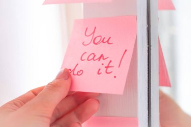 inspirational quotes on pink sticker on the mirror,handwriting text. clipart