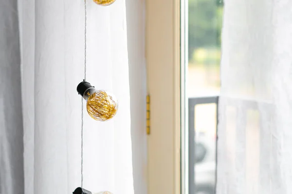 stock image garland with golden lamps,home decor.