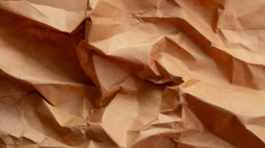 Tasarımlarınıza sıcaklık ve doku ekleyen bir el işi kağıdı arka planı