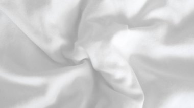 .Pürüzsüz beyaz kumaş arkaplan, ürün sunumu veya tasarım projeleri için minimalist zarafet