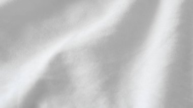 .Pürüzsüz beyaz kumaş arkaplan, ürün sunumu veya tasarım projeleri için minimalist zarafet