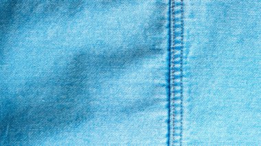 Detaylı desenli mavi kot kumaş. Moda ve tekstil tasarımı için mükemmel.