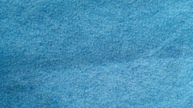 Detaylı desenli mavi kot kumaş. Moda ve tekstil tasarımı için mükemmel.