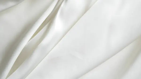 stock image white silk fabric background copy space.
