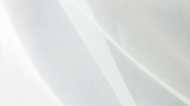 Ev yapımı tekstil ve gelinlik kumaşı için zarif beyaz tül arka plan. Narin ve rüya gibi tasarımlar yapmak için mükemmel..