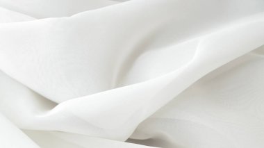 Ev yapımı tekstil ve gelinlik kumaşı için zarif beyaz tül arka plan. Narin ve rüya gibi tasarımlar yapmak için mükemmel..