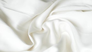 Yumuşak kıvrımlı ve hassas dokusu olan buruşuk beyaz ipek kumaş arkaplan